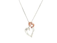 Sterling Silver Cascading Dual Heart Diamond Accented Pendant (.02 cttw)